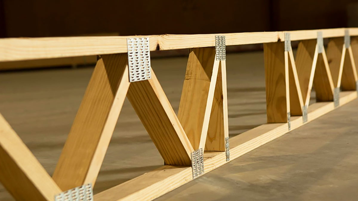 Open-web timber floor trusses installed on a commercial construction site in Georgia.
