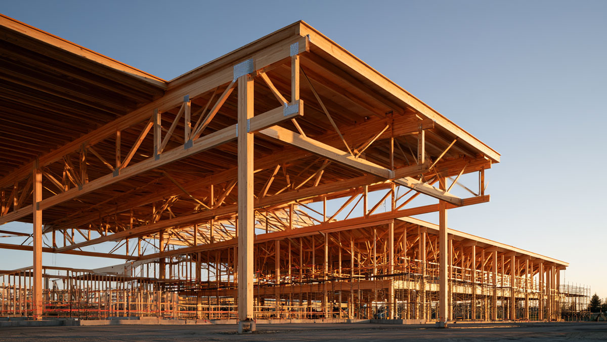Commercial development framed with clear-span timber roof trusses in Bentonville, Arkansas.