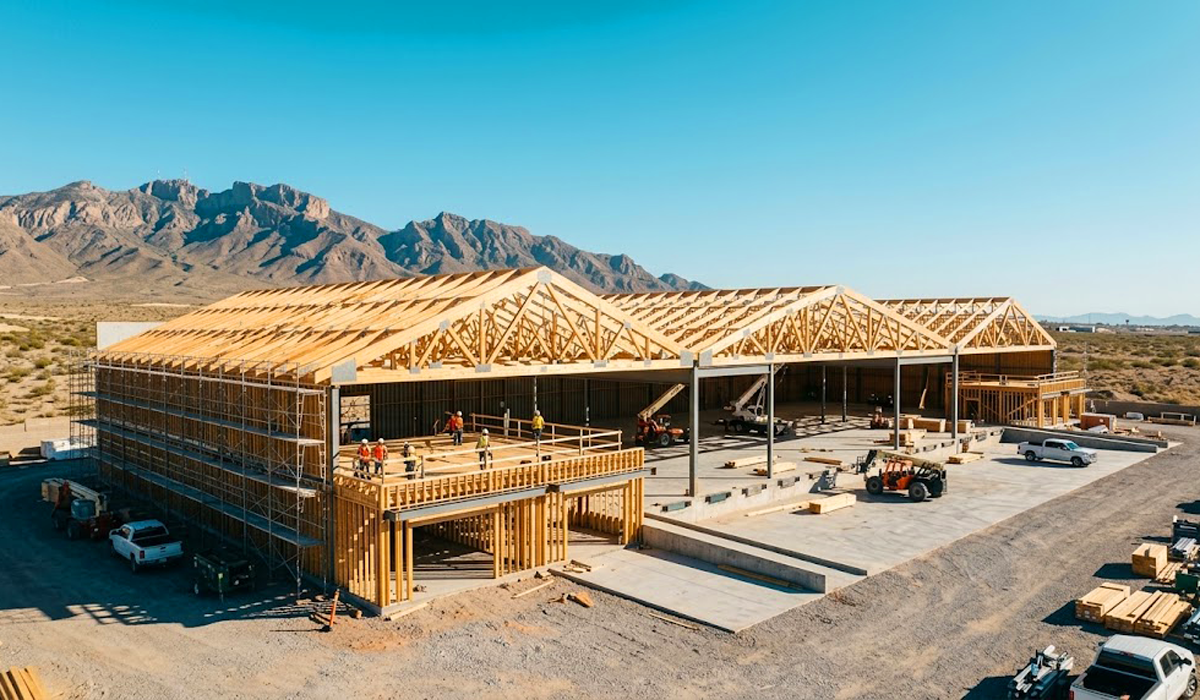 Clear-span timber roof trusses installed on a commercial distribution warehouse in El Paso, Texas.