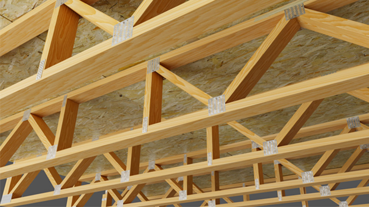 Open-web timber floor trusses installed on a commercial construction site in Florida.