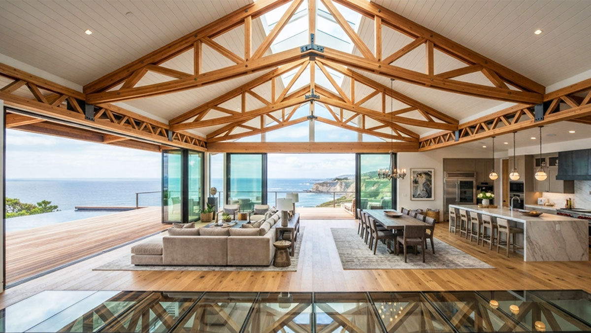 Vaulted scissor timber roof trusses installed in a custom coastal estate in Mobile, Alabama.
