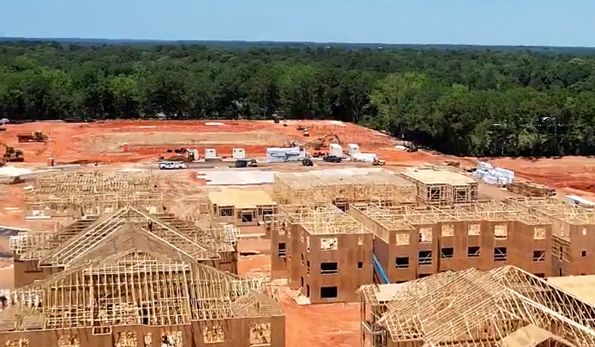 Multi-family framing project with roof trusses near Dallas North Tollway in Plano