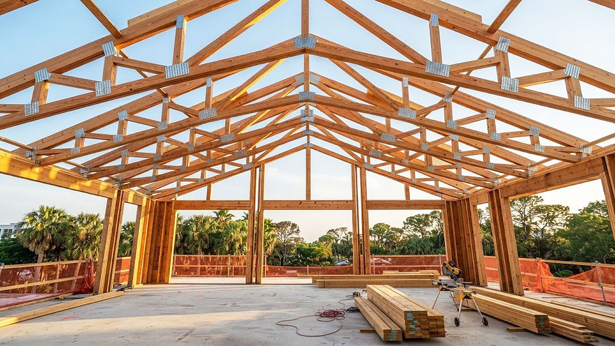 Vaulted scissor timber roof trusses installed in a custom coastal estate in Tampa Bay, Florida.
