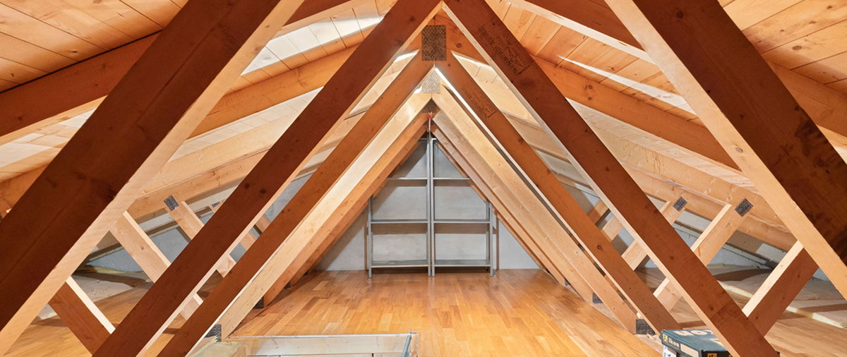 Clear-span Southern Yellow Pine engineered roof trusses framed on a commercial jobsite in Tennessee.